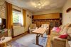 HTI | Charmanter Bungalow in grüner und idyllischer Parkrandlage von Frankfurt - Griesheim - Wohnzimmer