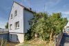 HTI | Ruhig gelegenes Zweifamilienhaus mit schönem Garten in Niddatal-Ilbenstadt - Straßenansicht