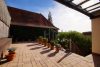 HTI | Schmuckes Einfamilienhaus mit großer Sonnenterrasse und idyllischem Garten - Terrasse