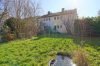 HTI | Familiengerechte Doppelhaushälfte mit Sonnengarten in beliebter Lage von Oberursel - Rückwärtige Hausansicht mit Garten