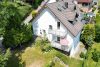 HTI | Wohnen wie im Urlaub: Topmoderne Doppelhaushälfte mit viel Platz und großem Garten in Schmitten - käuferprovisionsfrei - Luftbild
