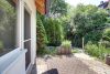 HTI | Wohnen wie im Urlaub: Topmoderne Doppelhaushälfte mit viel Platz und großem Garten in Schmitten - käuferprovisionsfrei - Morgenterrasse / EG