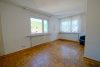 HTI | Solides Einfamilienhaus mit großem Garten in Schmitten - Wohnzimmer