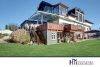 HTI | Außergewöhnliches Zweifamilienhaus im Grünen inklusive Feldbergblick in Usingen-Eschbach - Gartenansicht